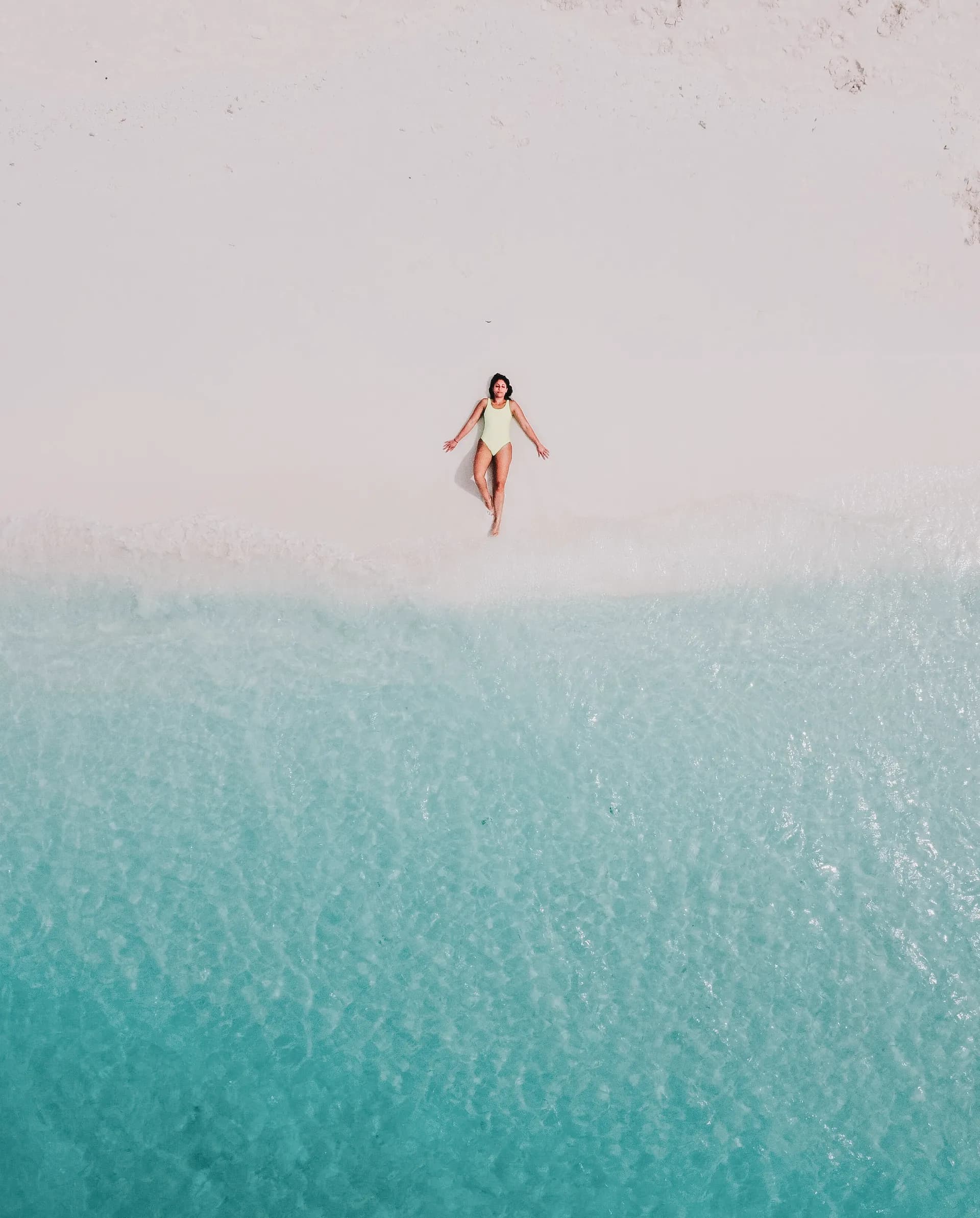 woman-resting-on-beach